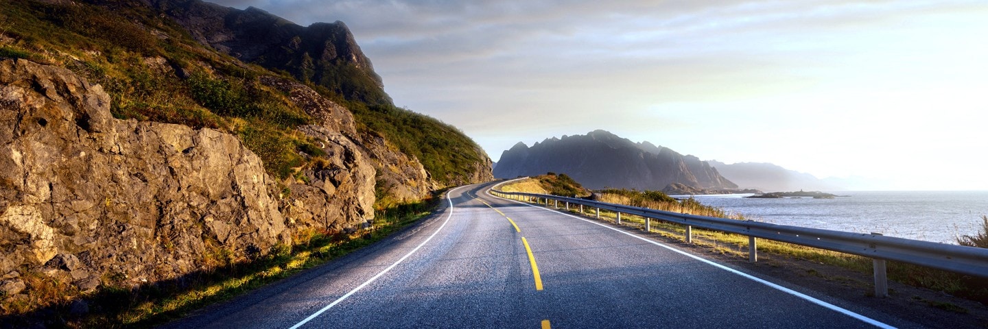 Image showing open road wrapping around a coast